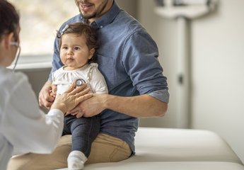 Father and baby and GP