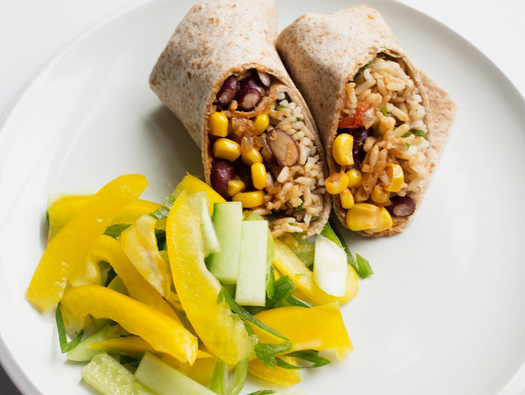 Rice and bean burrito with side salad