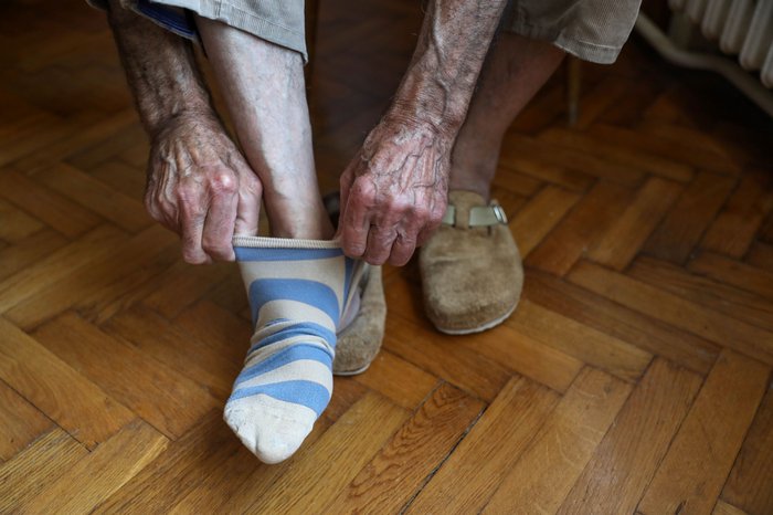 Foot care - pulling on socks