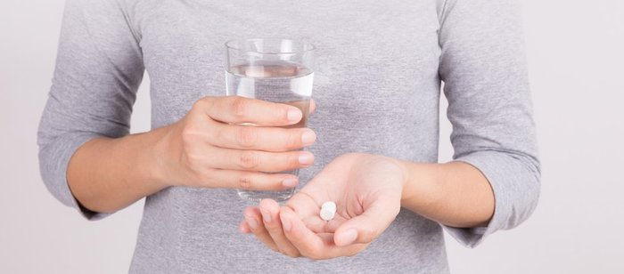 medication - over-the-counter - pill and water
